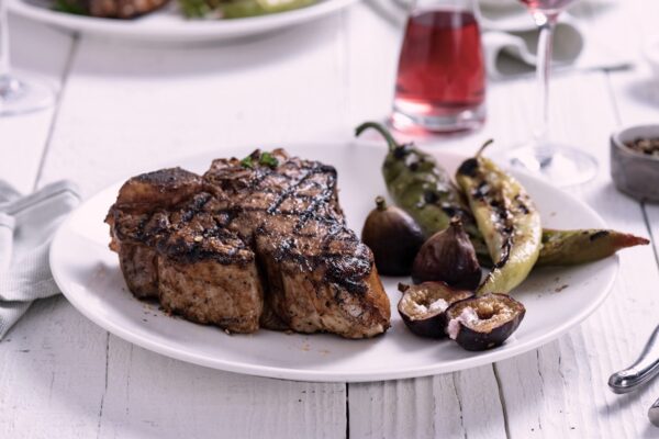Szechuan Peppercorn-Grilled Porterhouse, Goat Cheese-Stuffed Figs, and Blistered Peppers
