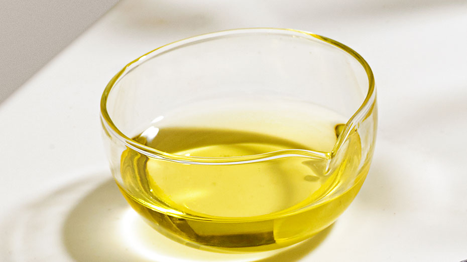 A bowl of almond oil